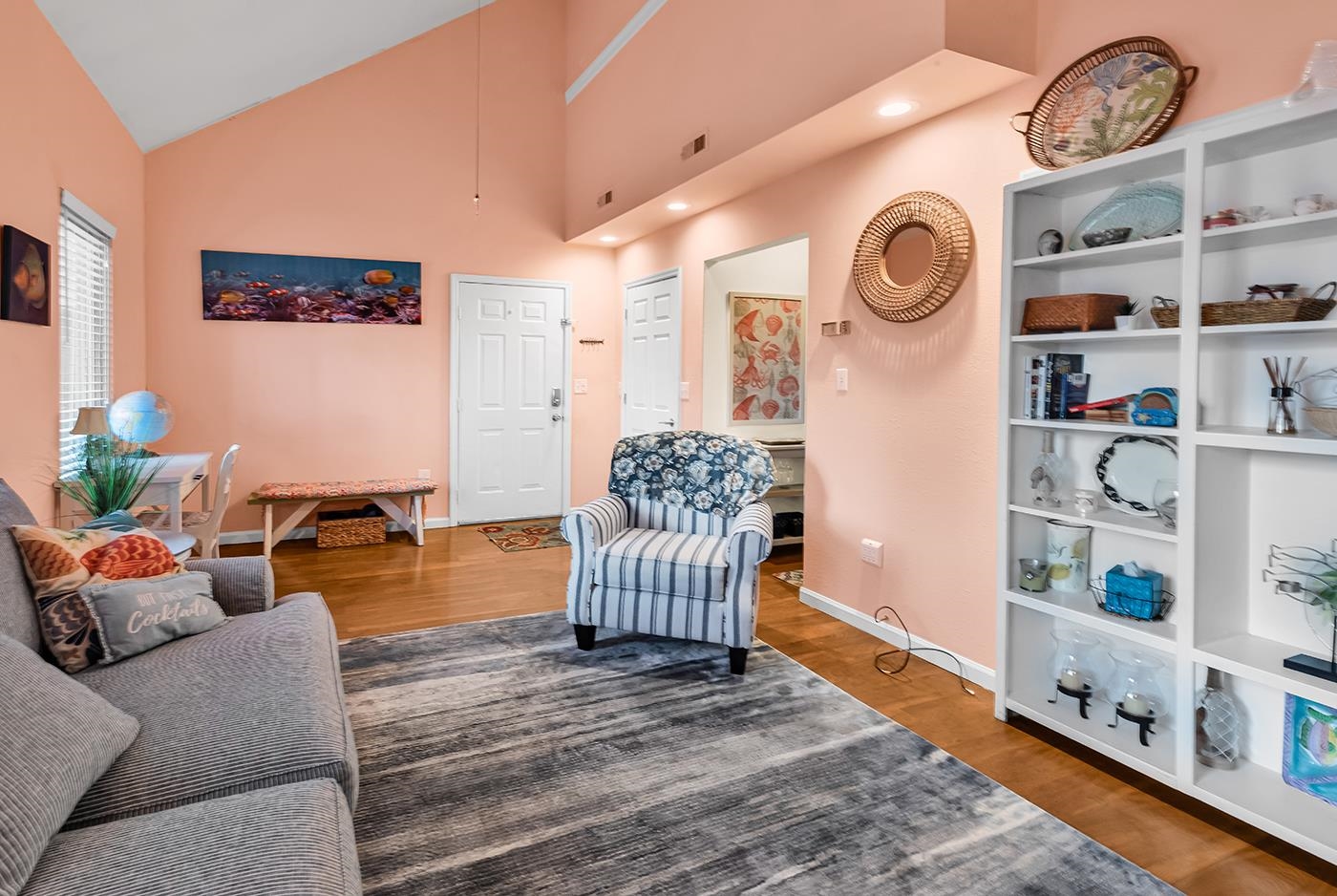724 Juniper Drive, Unit B Surfside Beach, SC 29575 - Photo 6 of 36 Living area featuring wood finished floors and high vaulted ceiling