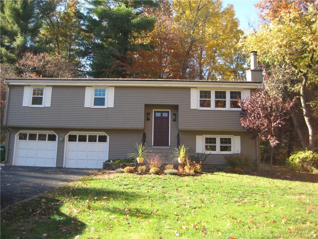 191 Merriman Road Windsor, CT 06095 - Photo 1 of 1 a front view of a house with a yard