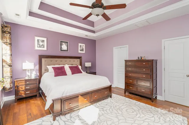 a bathroom with a double vanity sink mirror and shower