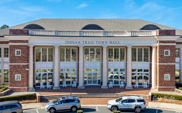 a view of street with sitting area
