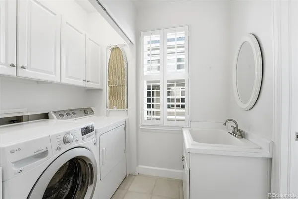 a bathroom with a toilet and a sink