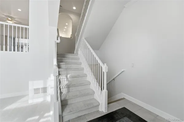 a view of entryway with wooden floor