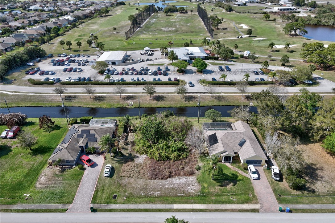 306 Main Street Sebastian, FL 32958 - Photo 3 of 10 an aerial view of a house with a lake view
