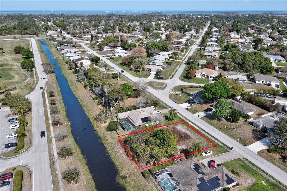 306 Main Street Sebastian, FL 32958 - Photo 5 of 10 an aerial view of residential houses with outdoor space