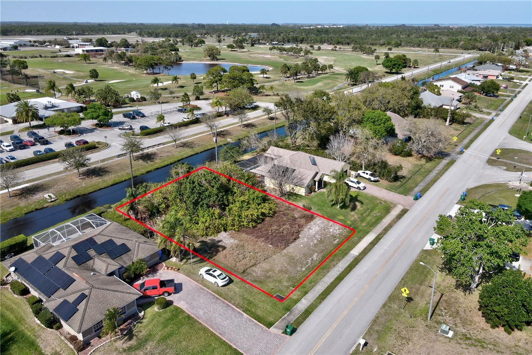 306 Main Street Sebastian, FL 32958 - Photo 6 of 10 an aerial view of residential houses with outdoor space and street view