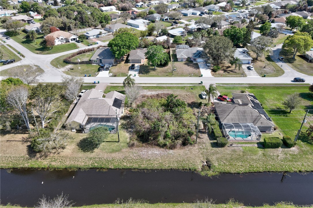 306 Main Street Sebastian, FL 32958 - Photo 7 of 10 an aerial view of residential houses with outdoor space