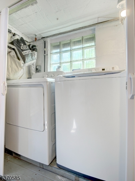 73 South Maple Avenue Springfield, NJ 07081 - Photo 26 of 26 a bathroom with a window and a shower