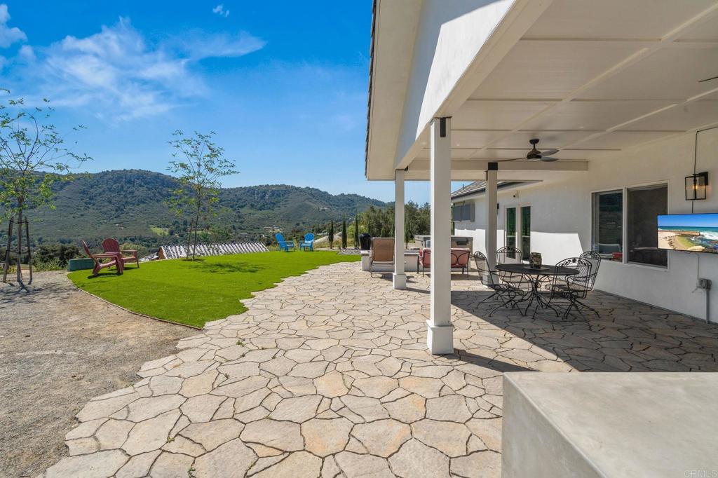 15663 Mathew Road Valley Center, CA 92082 - Photo 37 of 55 a view of a patio with a table and chairs