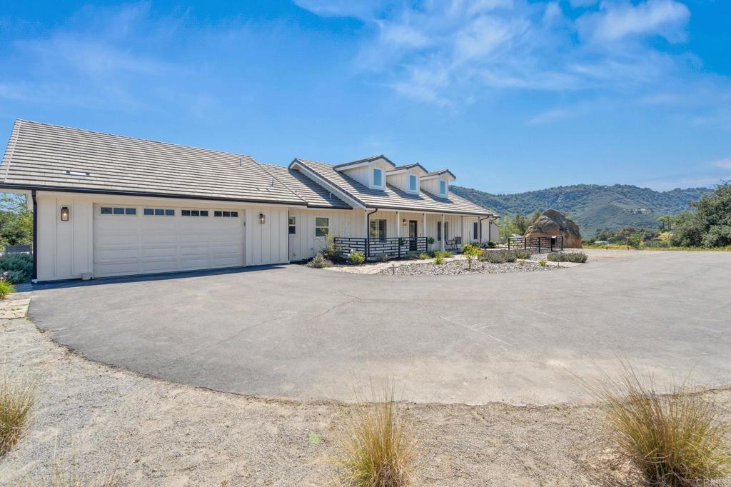 15663 Mathew Road Valley Center, CA 92082 - Photo 44 of 55 a view of multiple houses with a road