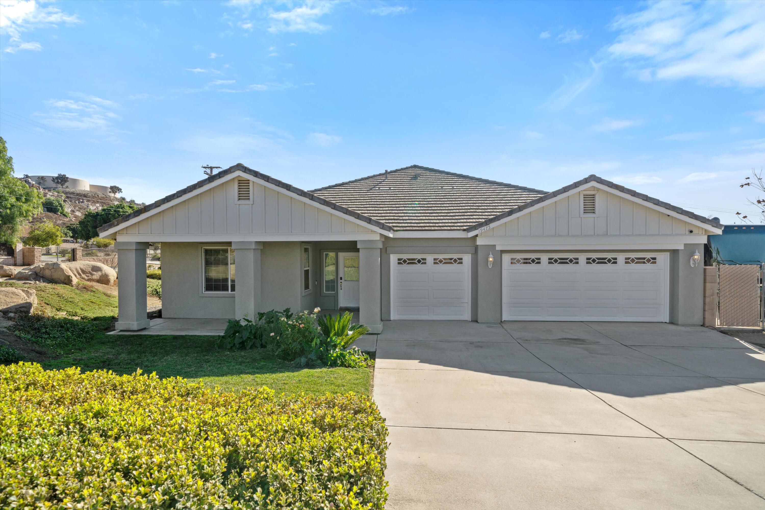 19475 Spalding Avenue Riverside, CA 92508 - Photo 1 of 50 front view of a house with a yard