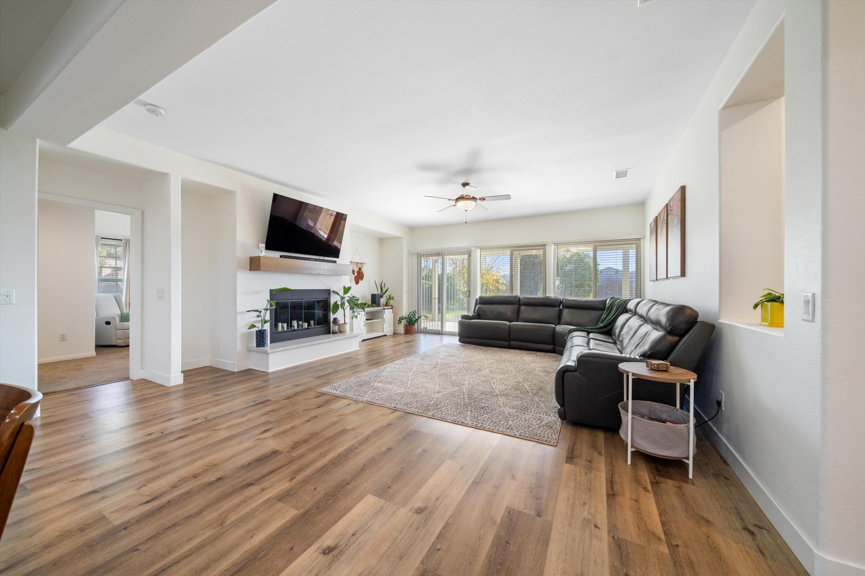 19475 Spalding Avenue Riverside, CA 92508 - Photo 15 of 50 a living room with furniture and a flat screen tv
