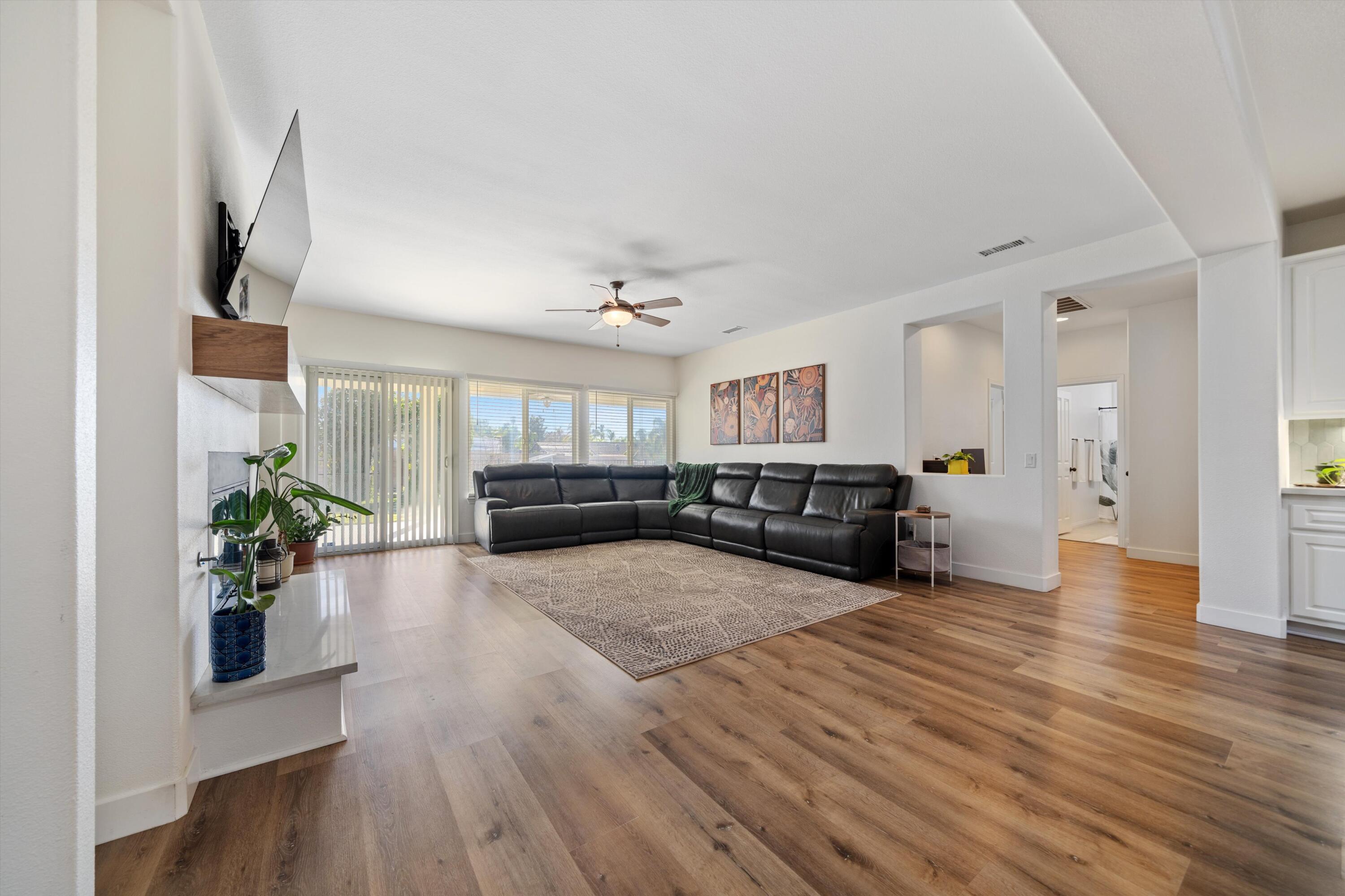 19475 Spalding Avenue Riverside, CA 92508 - Photo 17 of 50 a living room with furniture and a wooden floor