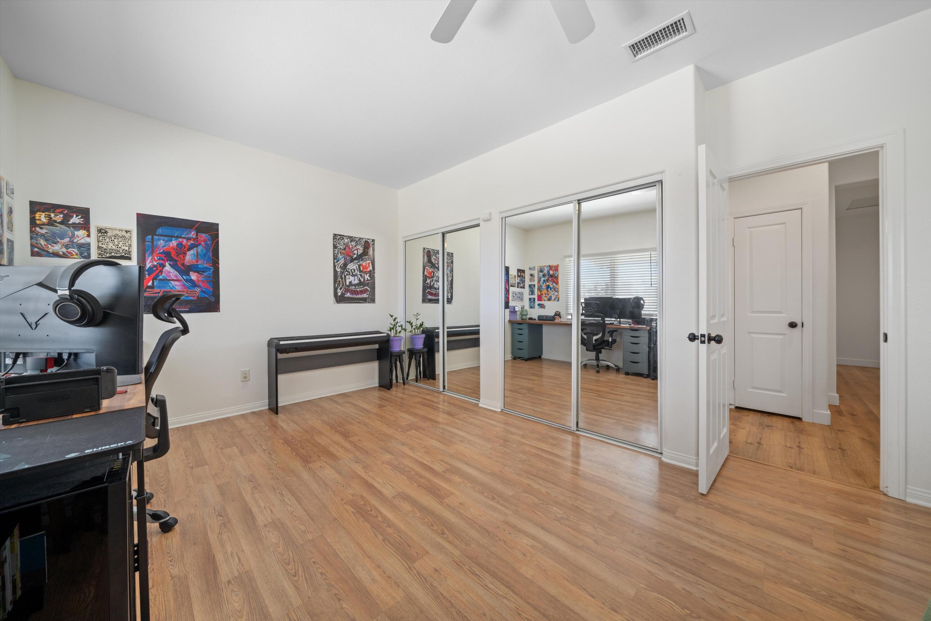 19475 Spalding Avenue Riverside, CA 92508 - Photo 24 of 50 a view of a room with wooden floor and furniture