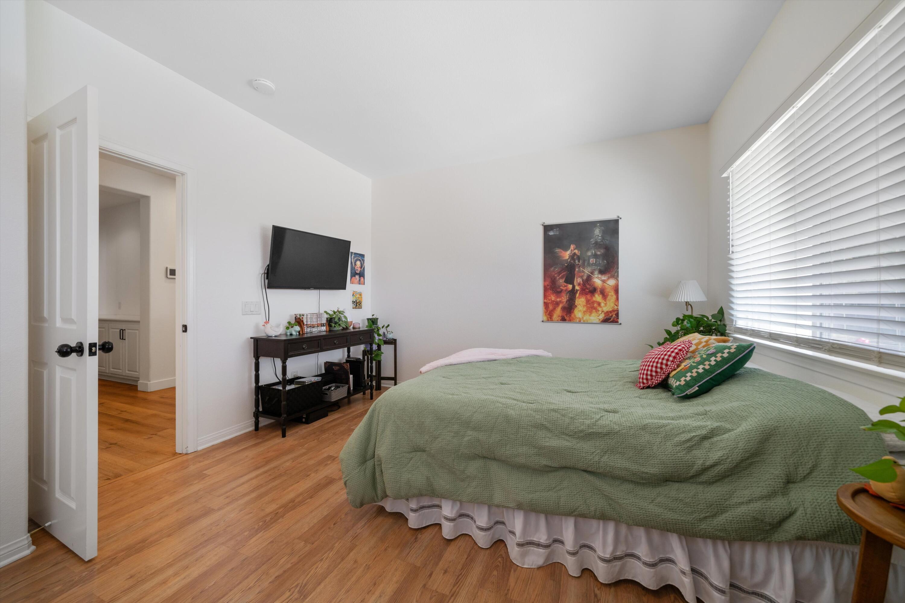 19475 Spalding Avenue Riverside, CA 92508 - Photo 26 of 50 a bedroom with a bed and a television