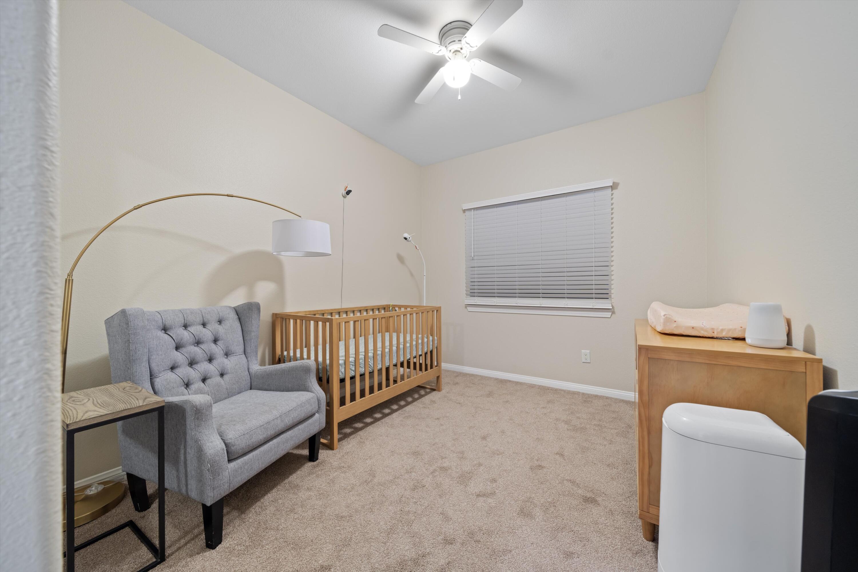 19475 Spalding Avenue Riverside, CA 92508 - Photo 27 of 50 a bedroom with a bed and a couch