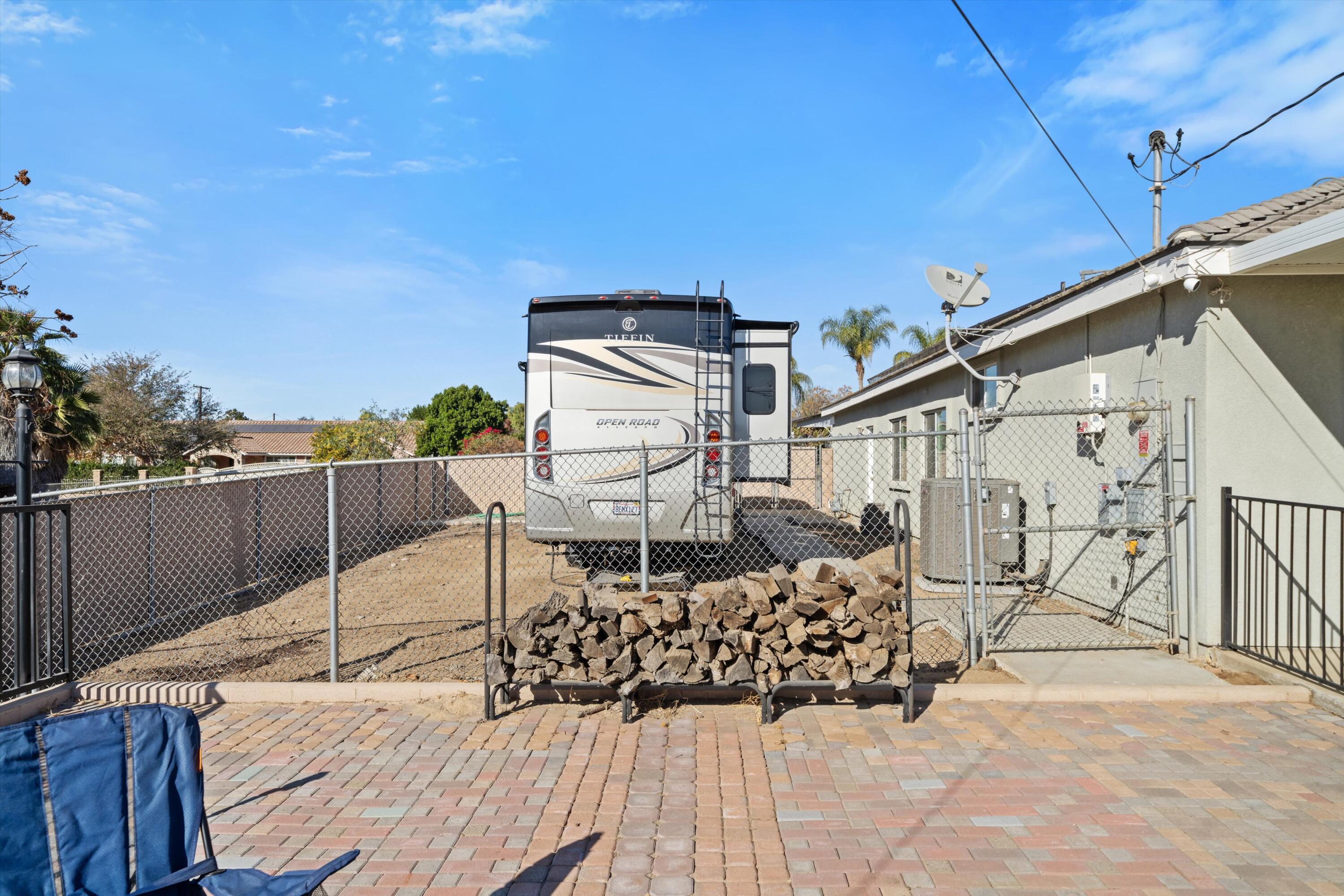 19475 Spalding Avenue Riverside, CA 92508 - Photo 35 of 50 a view of a roof deck with wooden fence