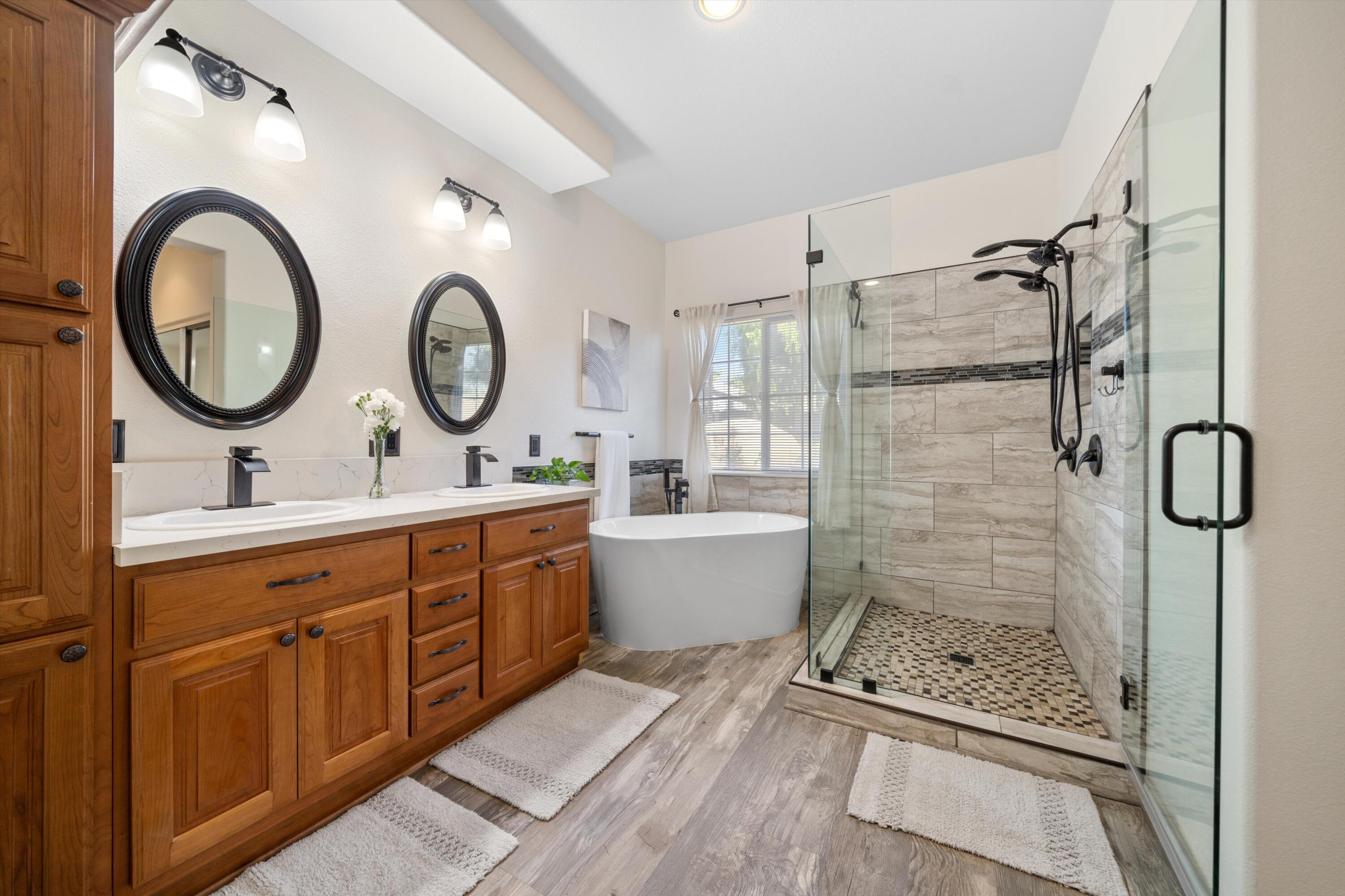 19475 Spalding Avenue Riverside, CA 92508 - Photo 4 of 50 a bathroom with a double vanity sink mirror and shower