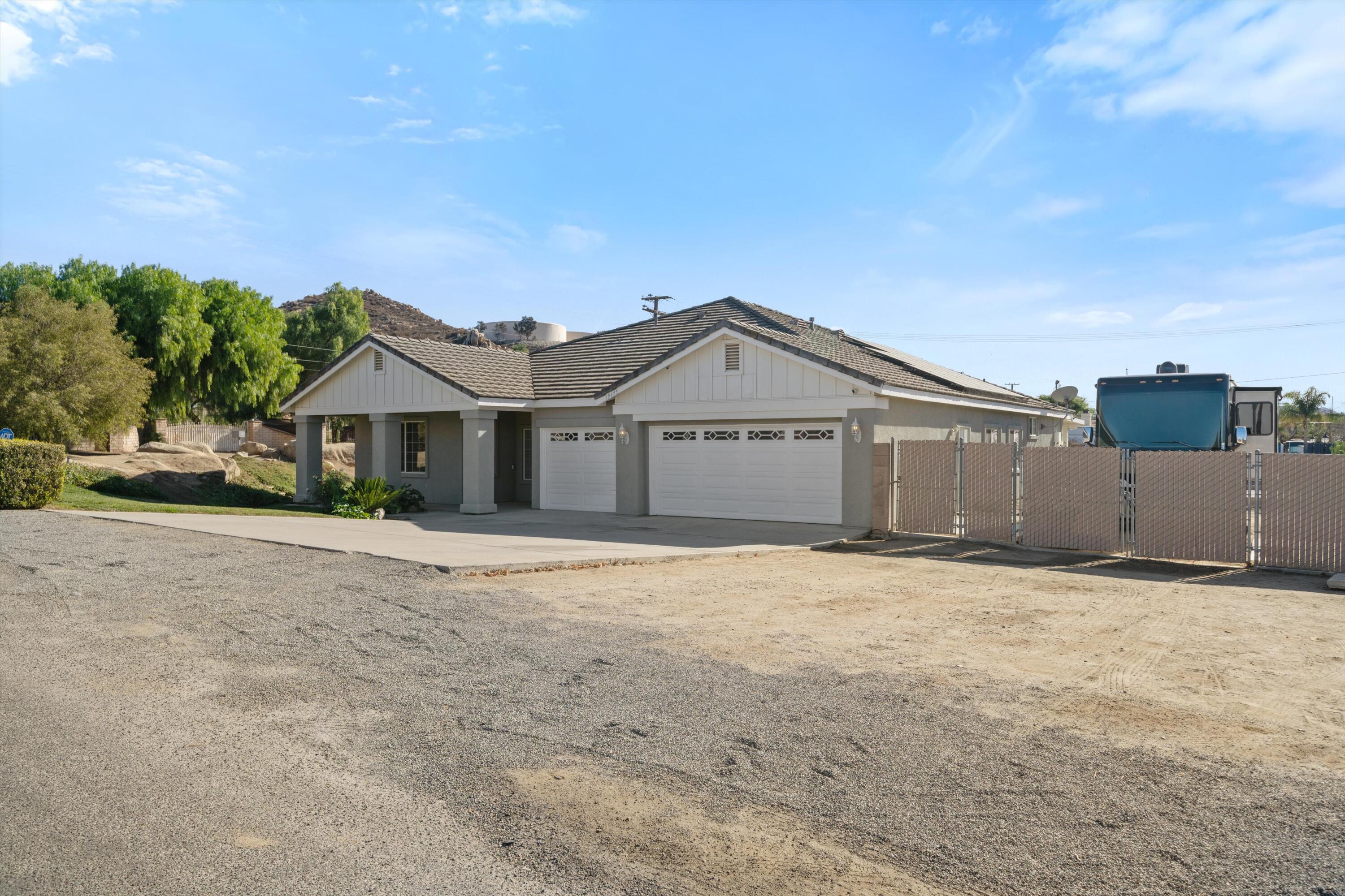 19475 Spalding Avenue Riverside, CA 92508 - Photo 41 of 50 a front view of a house with a yard