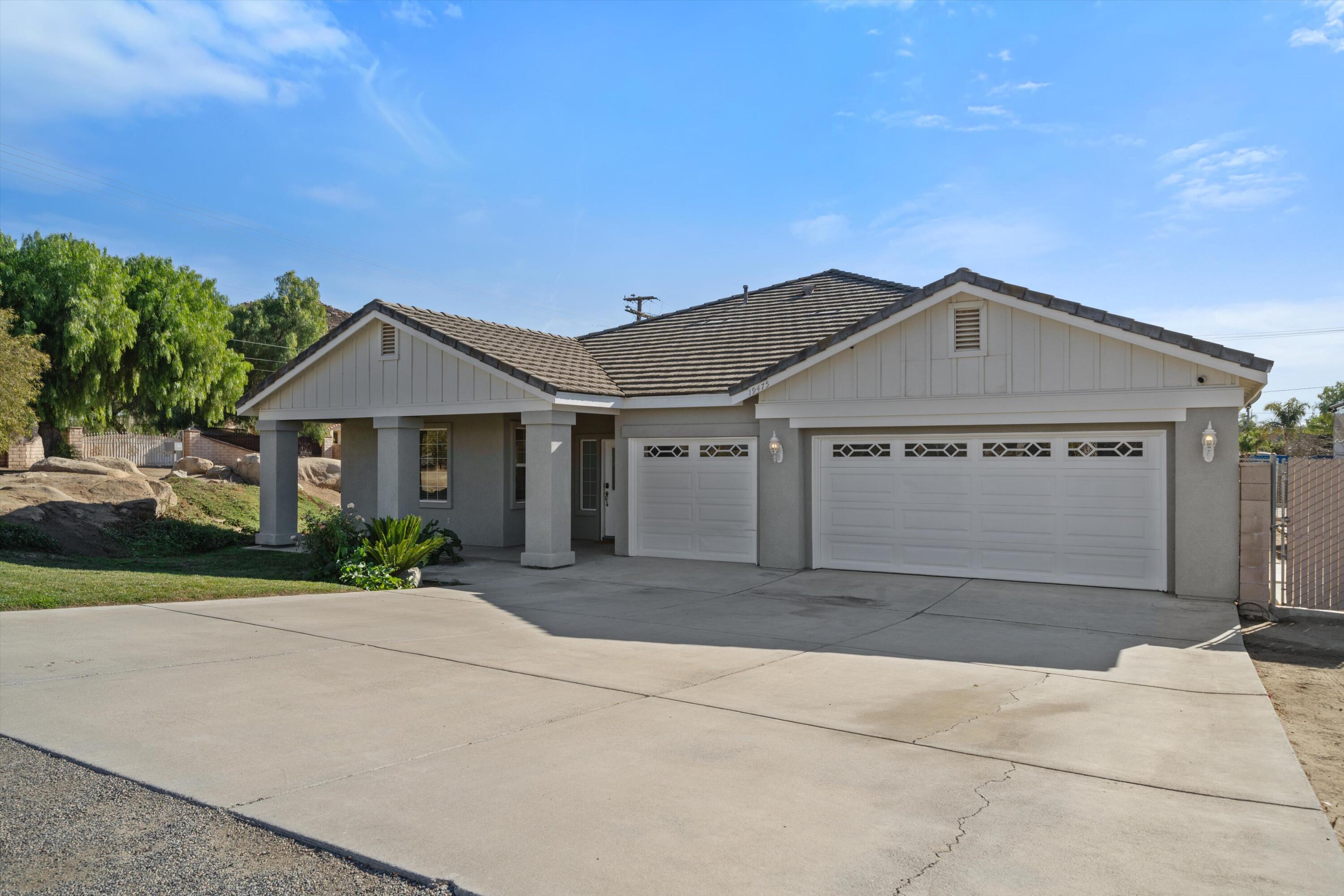 19475 Spalding Avenue Riverside, CA 92508 - Photo 42 of 50 front view of a house with a yard