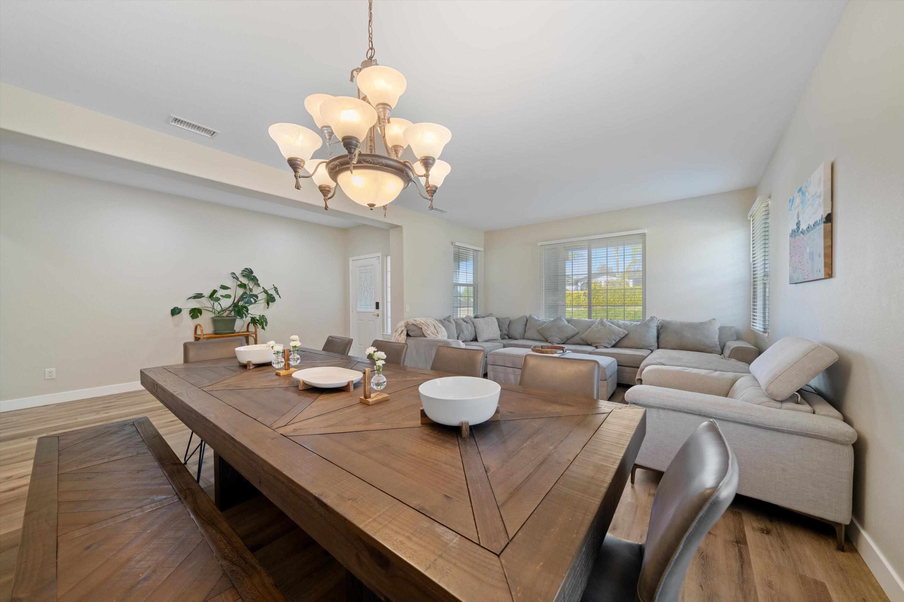 19475 Spalding Avenue Riverside, CA 92508 - Photo 6 of 50 a view of a dining room with furniture and wooden floor