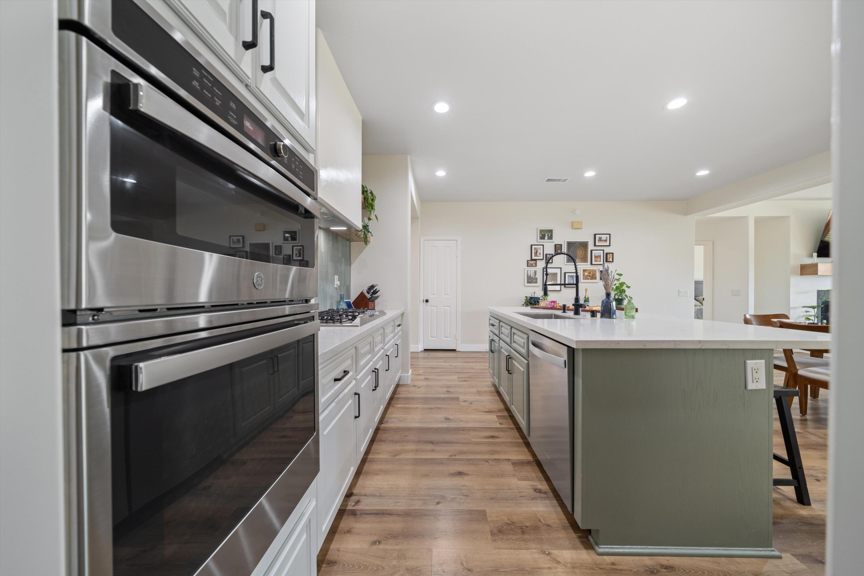 19475 Spalding Avenue Riverside, CA 92508 - Photo 10 of 50 a kitchen with a sink and stainless steel appliances