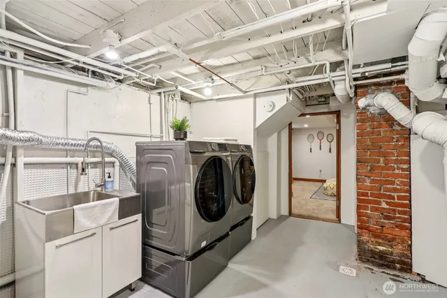 a utility room with dryer and washer