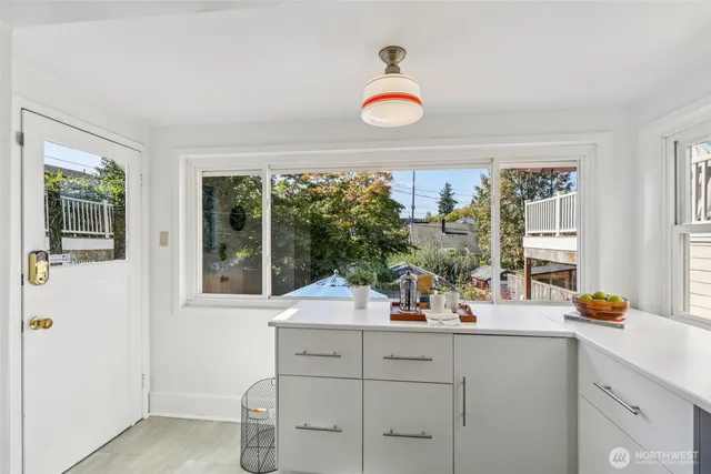 a kitchen with a sink and a window