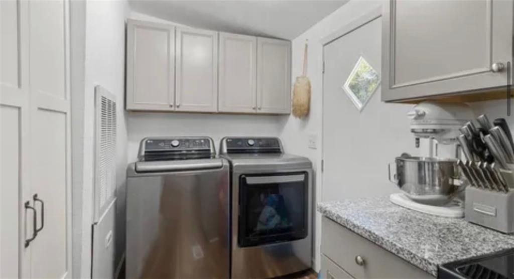 185 Cedar Lane Morganton, GA 30560 - Photo 3 of 9 a kitchen with a sink a stove and cabinets
