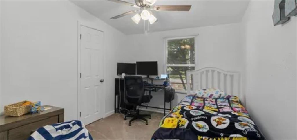 185 Cedar Lane Morganton, GA 30560 - Photo 7 of 9 a view of a workspace with a window and storage