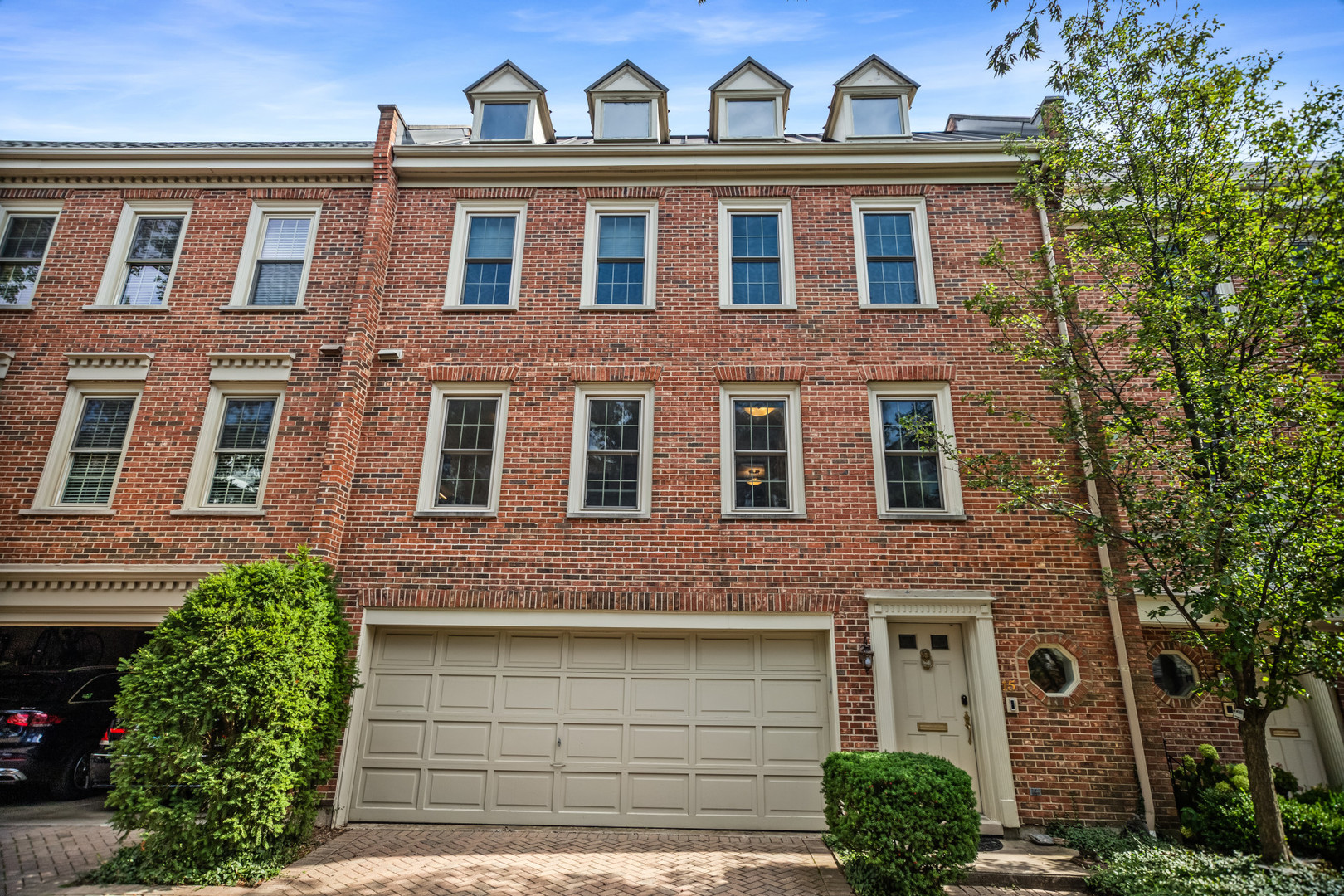 15 Landmark Street Northfield, IL 60093 - Photo 1 of 24 a view of a brick building next to a yard