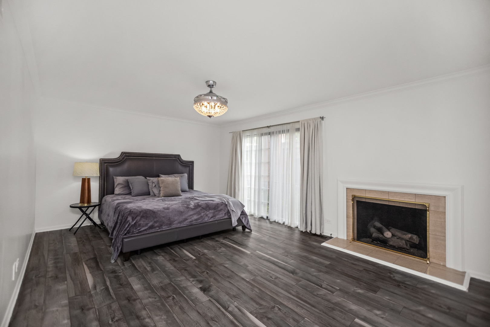 15 Landmark Street Northfield, IL 60093 - Photo 16 of 24 a bedroom with a bed and a fireplace