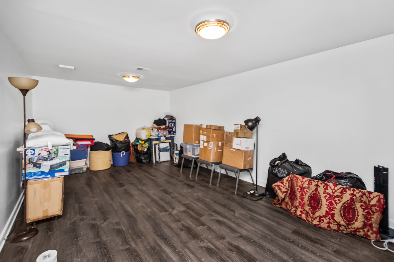 15 Landmark Street Northfield, IL 60093 - Photo 3 of 24 a view of a room with lots of stuff
