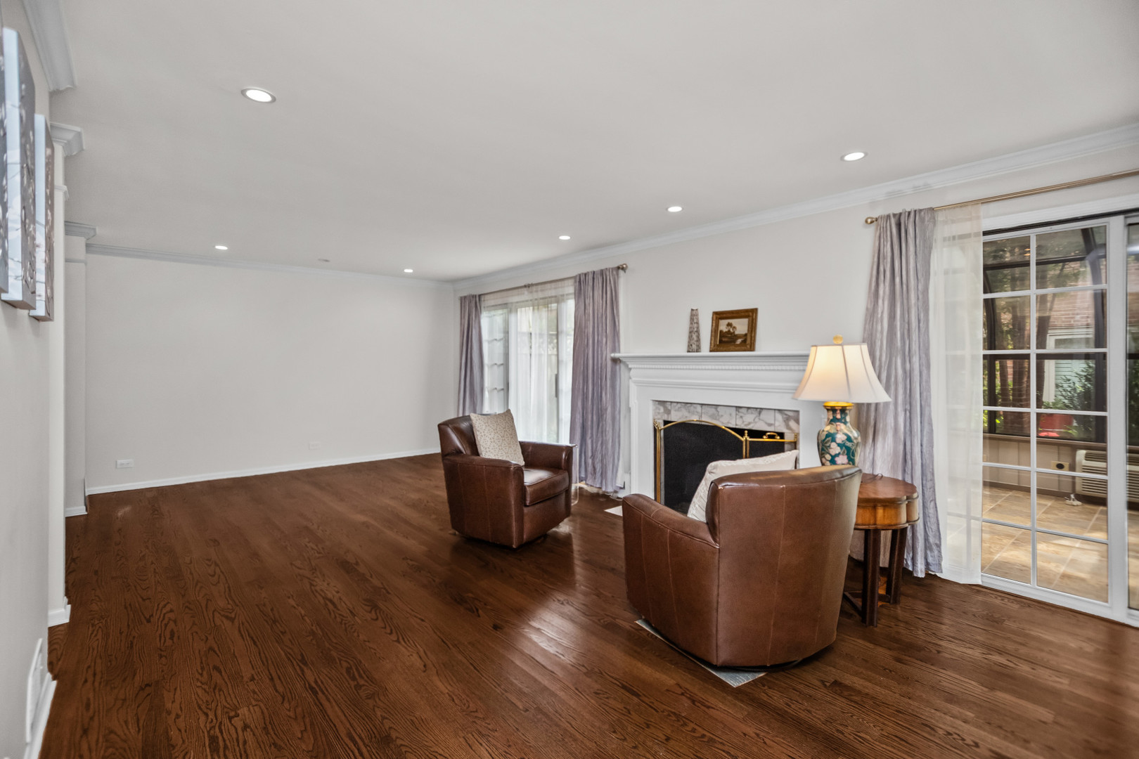 15 Landmark Street Northfield, IL 60093 - Photo 5 of 24 a living room with furniture and a fireplace