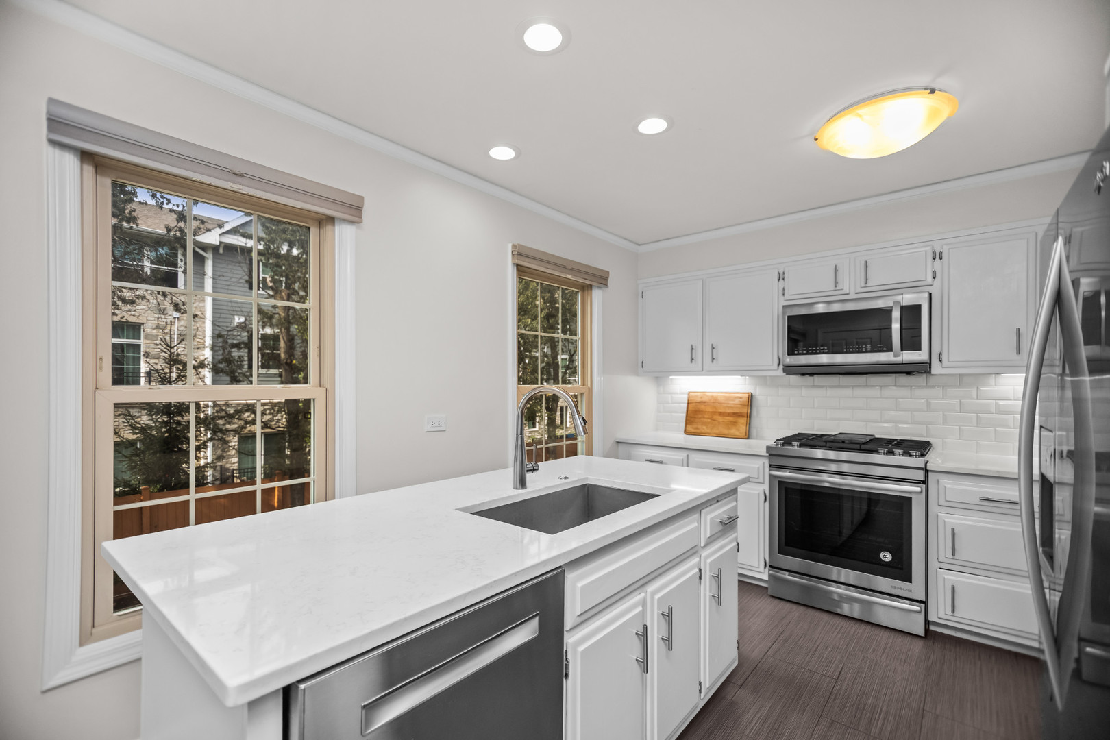 15 Landmark Street Northfield, IL 60093 - Photo 10 of 24 a kitchen that has a sink and a stove