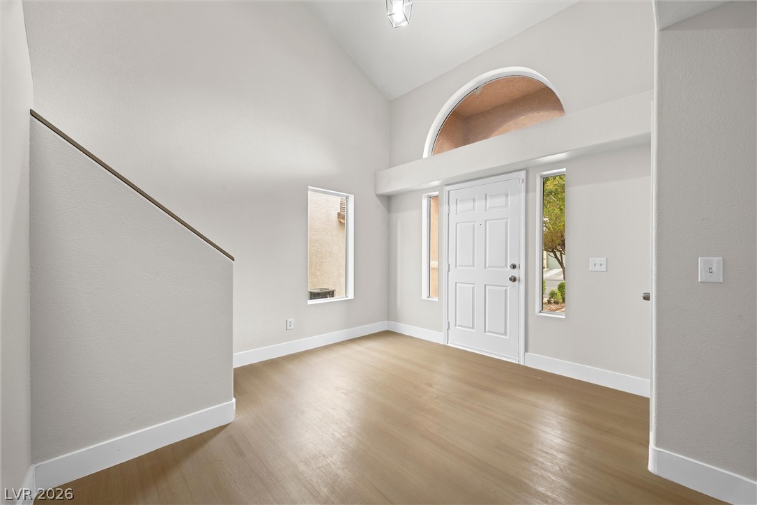 2650 Whisper Ridge Street Las Vegas, NV 89156 - Photo 6 of 28 An airy entryway greets guests with soaring ceilings and clean architectural lines.