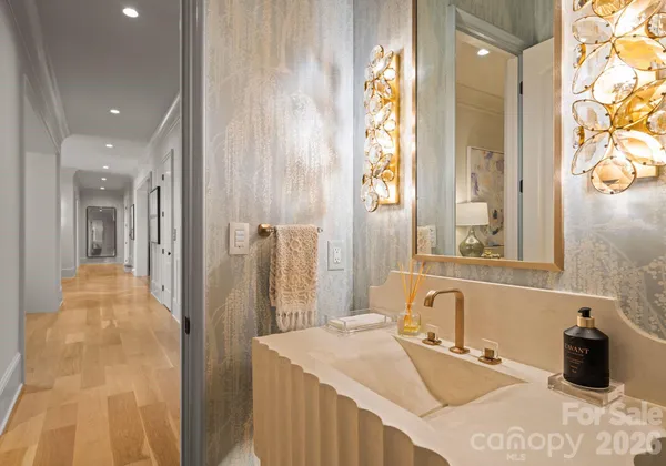 a bathroom with a sink double vanity and a mirror