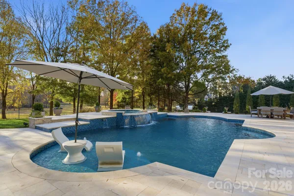 a view of a patio with swimming pool