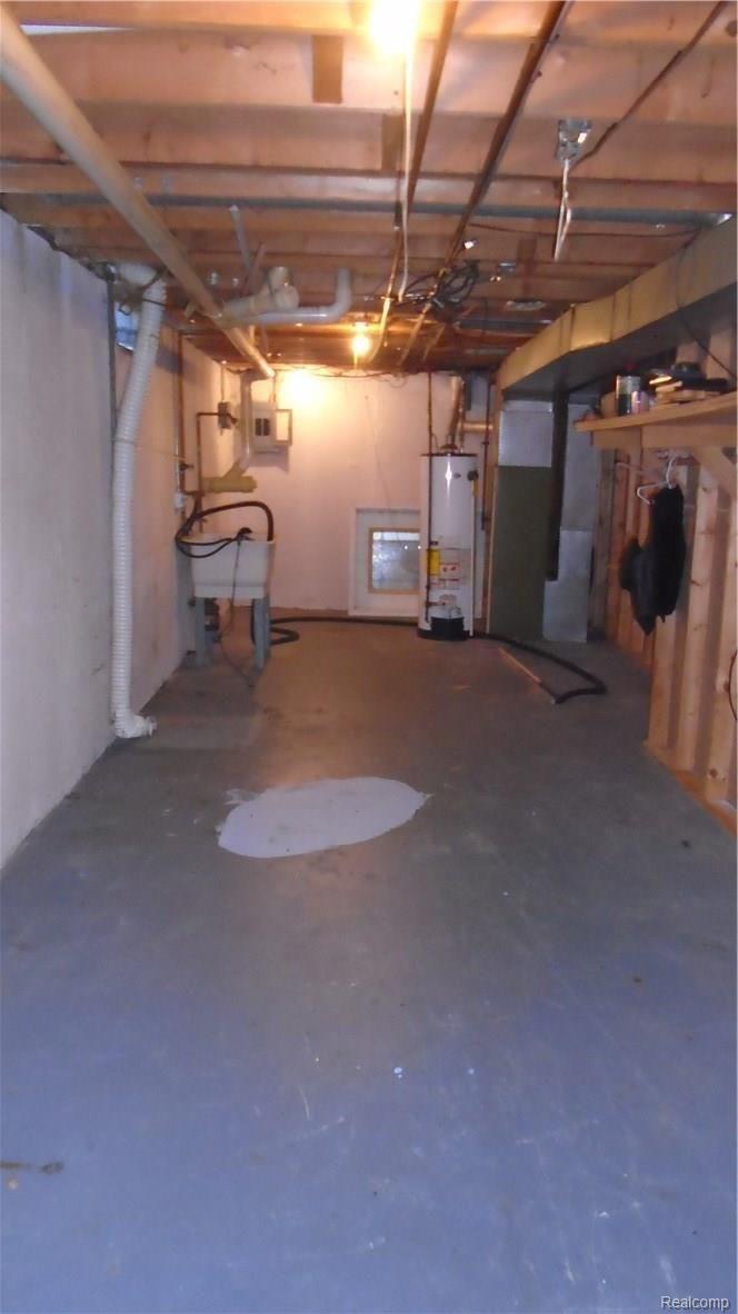 2659 Benstein Road, Unit 7 Commerce Township, MI 48382 - Photo 15 of 20 Utility area with storage galore