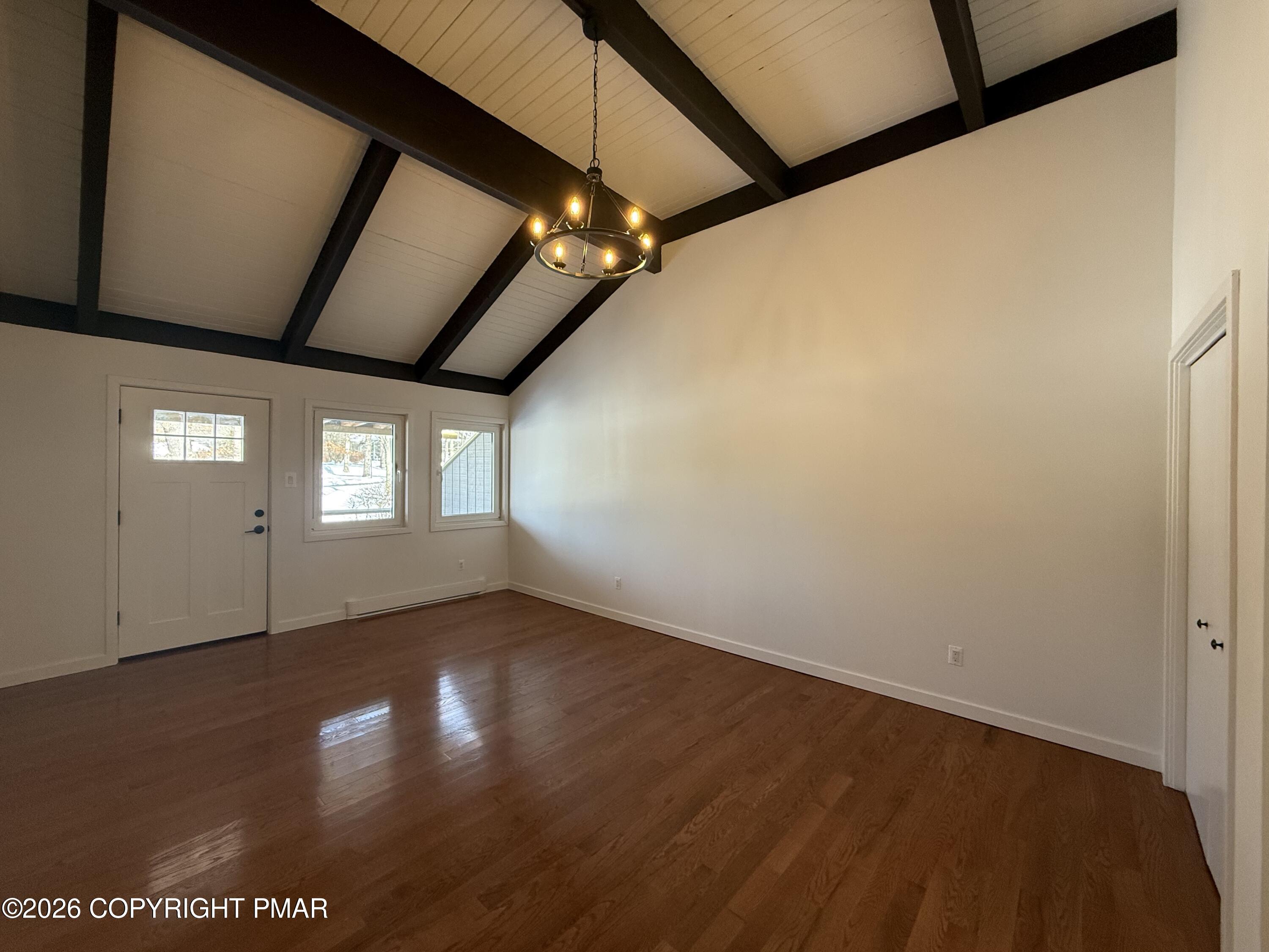 104 Condor Drive, Unit 1 Tamiment, PA 18371 - Photo 20 of 23 a view of an empty room with a window