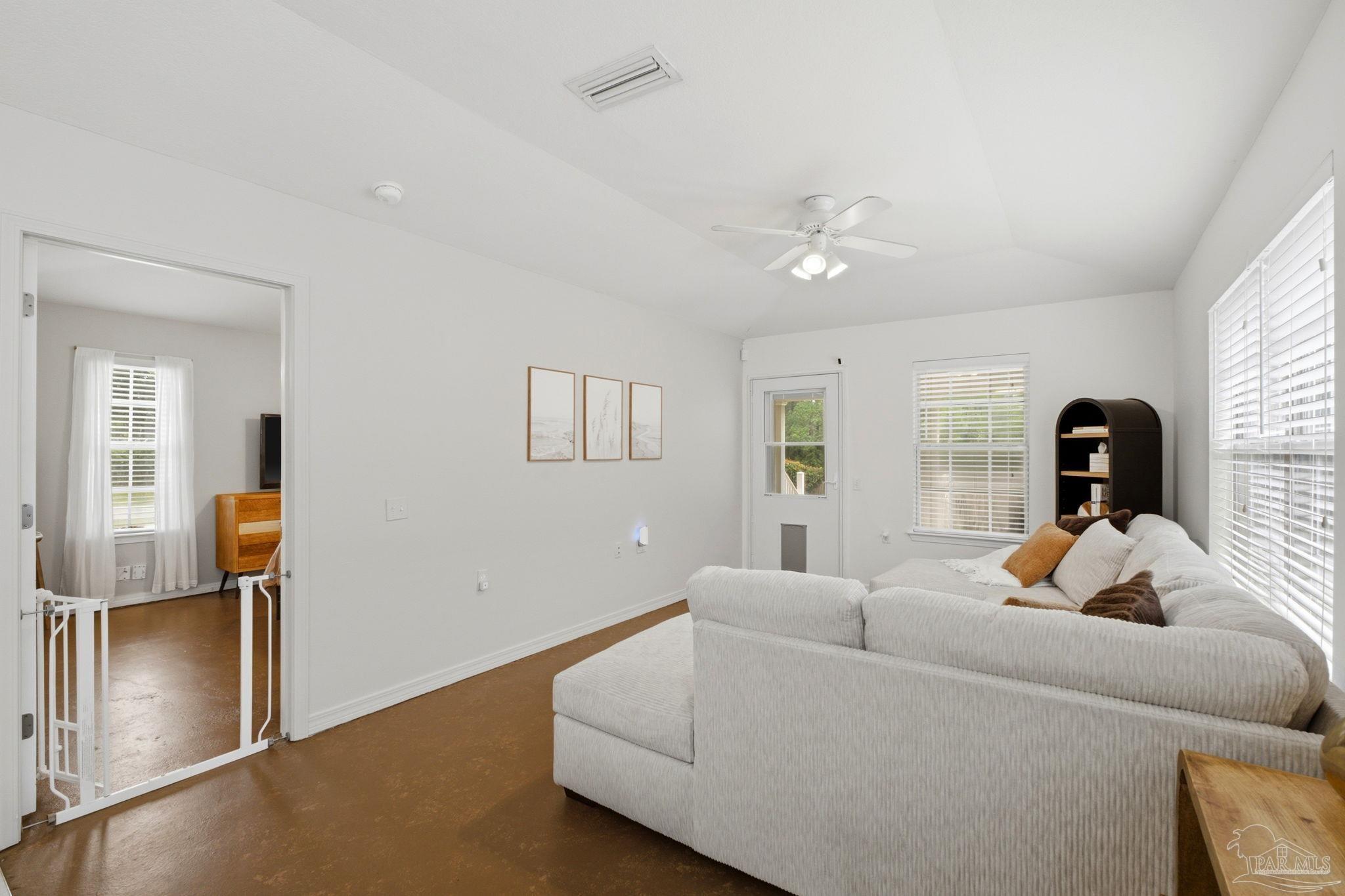 1237 Brownfield Road Pensacola, FL 32526 - Photo 18 of 30 a living room with furniture and a window