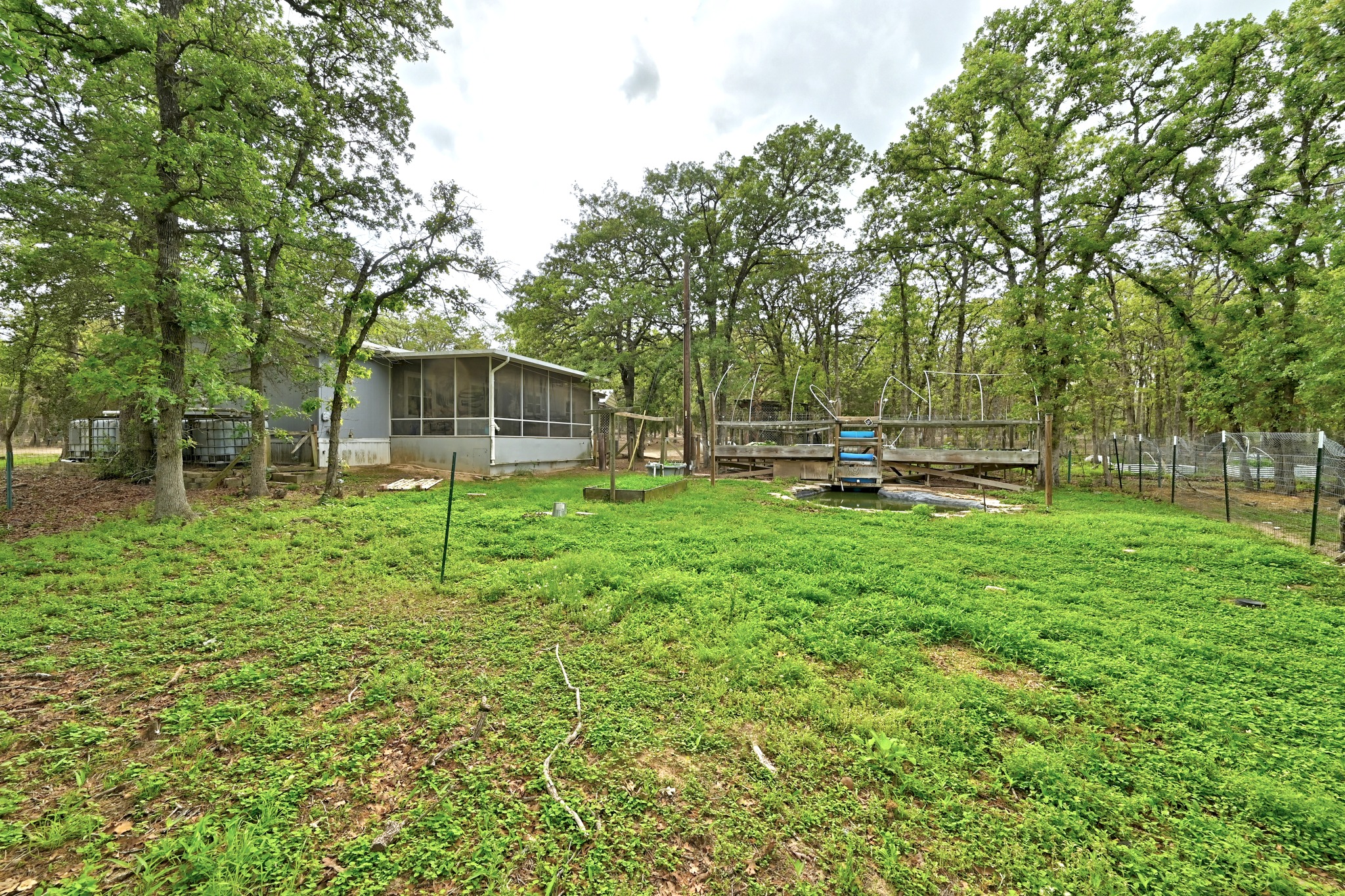 124 Coyote Lane Elgin, TX 78621 - Photo 27 of 40 a view of a house with a backyard