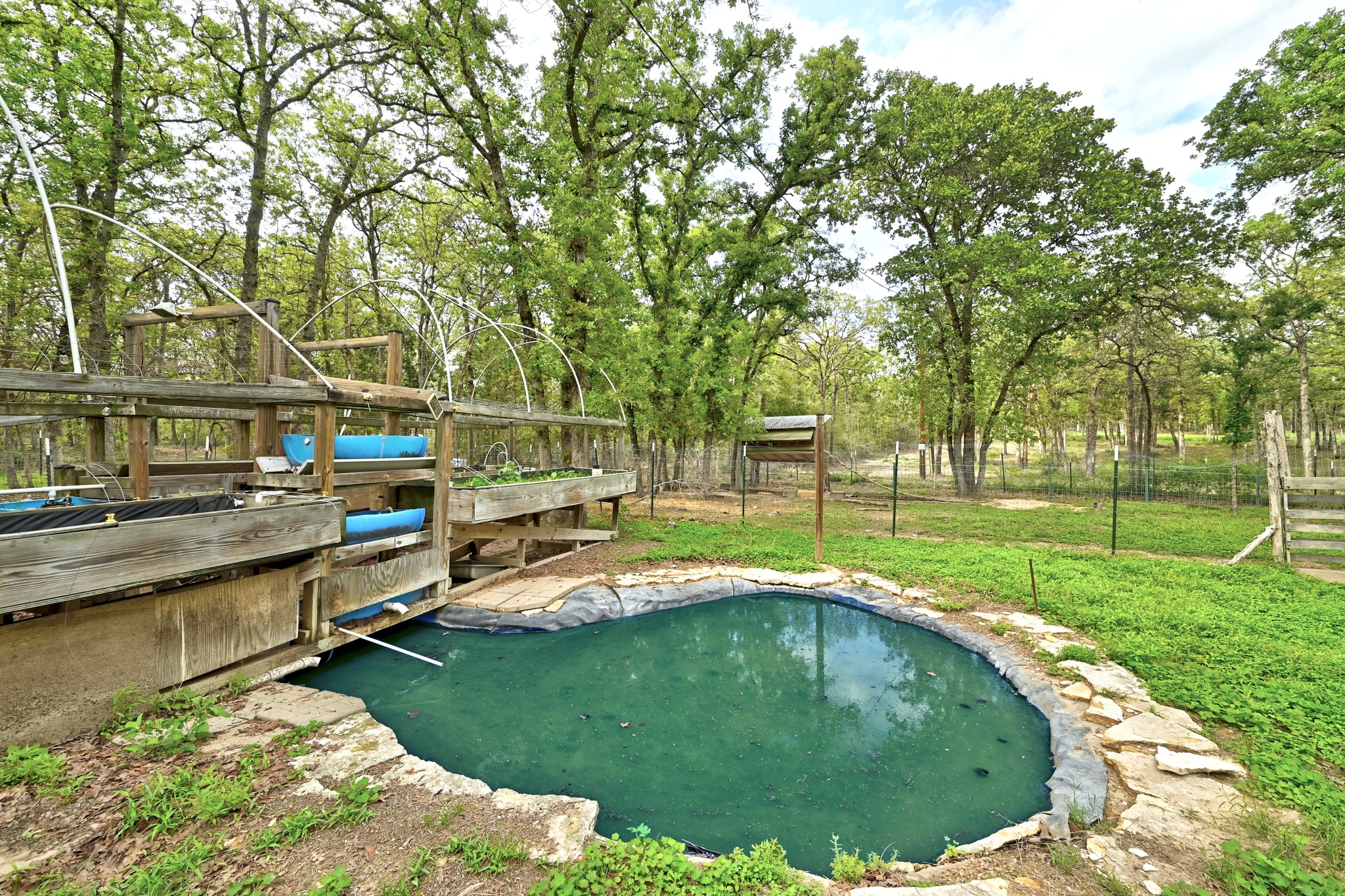 124 Coyote Lane Elgin, TX 78621 - Photo 28 of 40 a view of a swimming pool with a patio