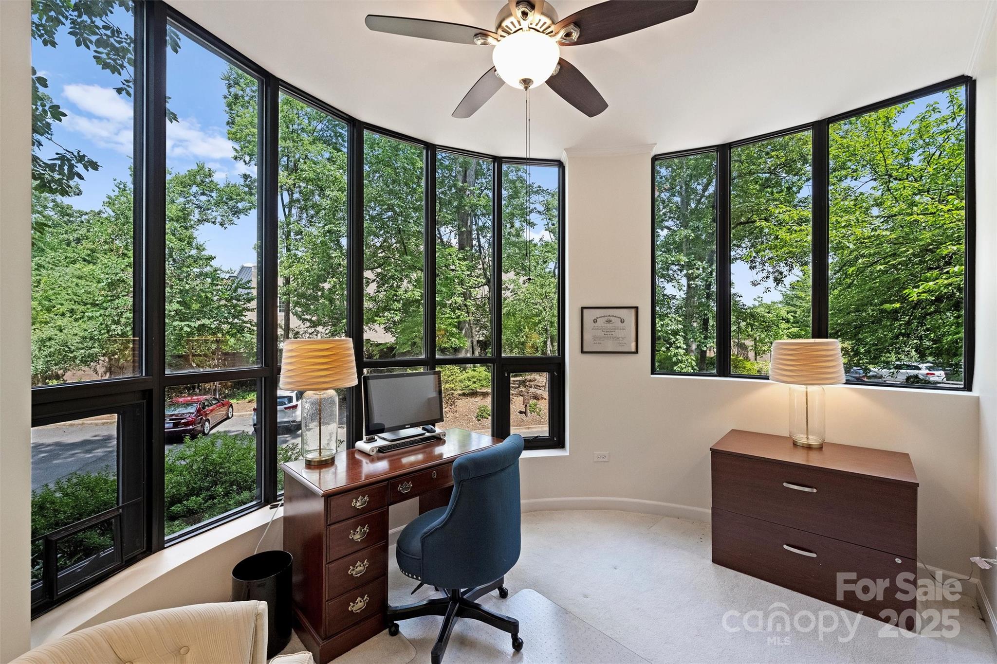 904 Cherokee Road Charlotte, NC 28207 - Photo 13 of 36 a view of a workspace with furniture and a window