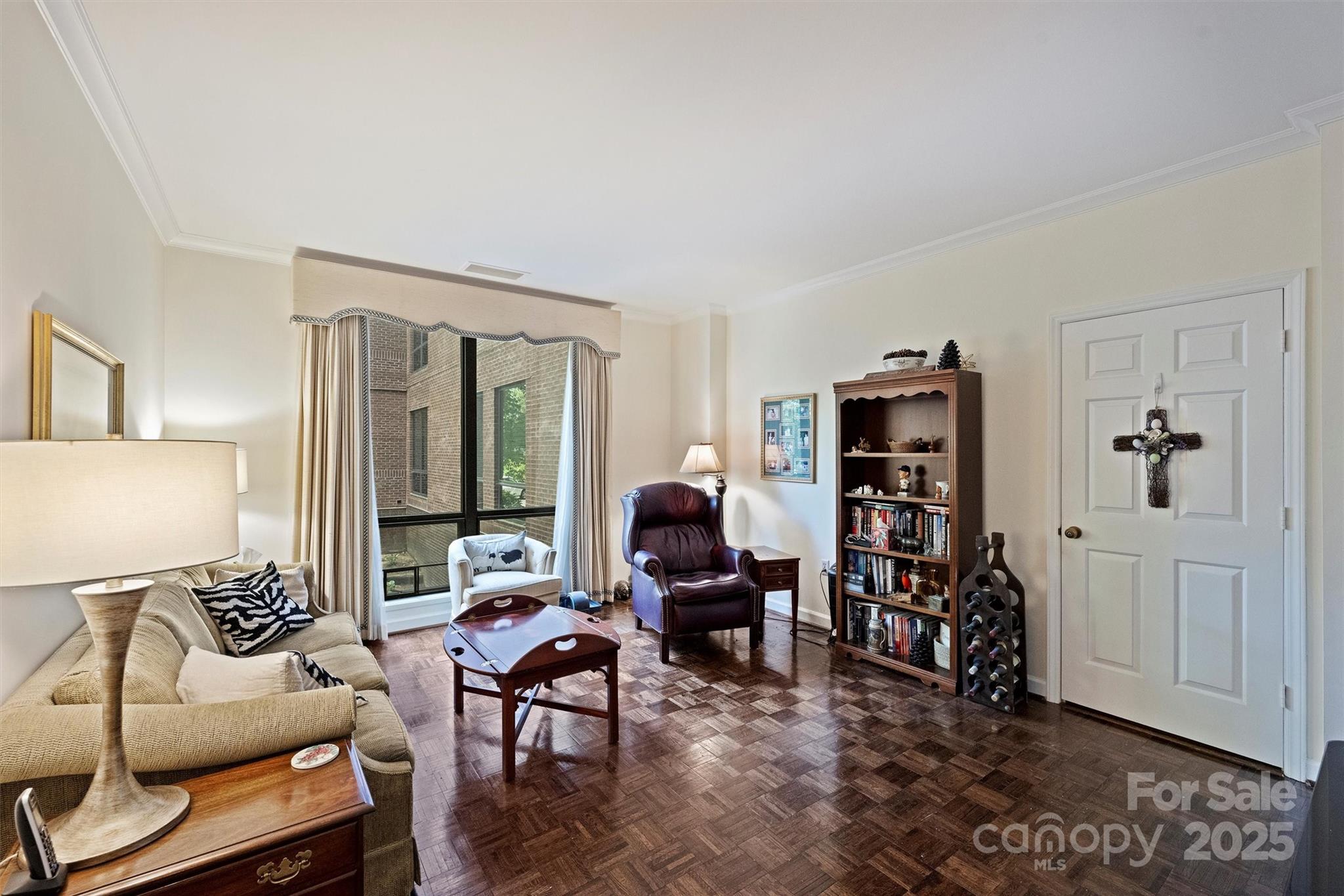 904 Cherokee Road Charlotte, NC 28207 - Photo 20 of 36 a living room with furniture and a window