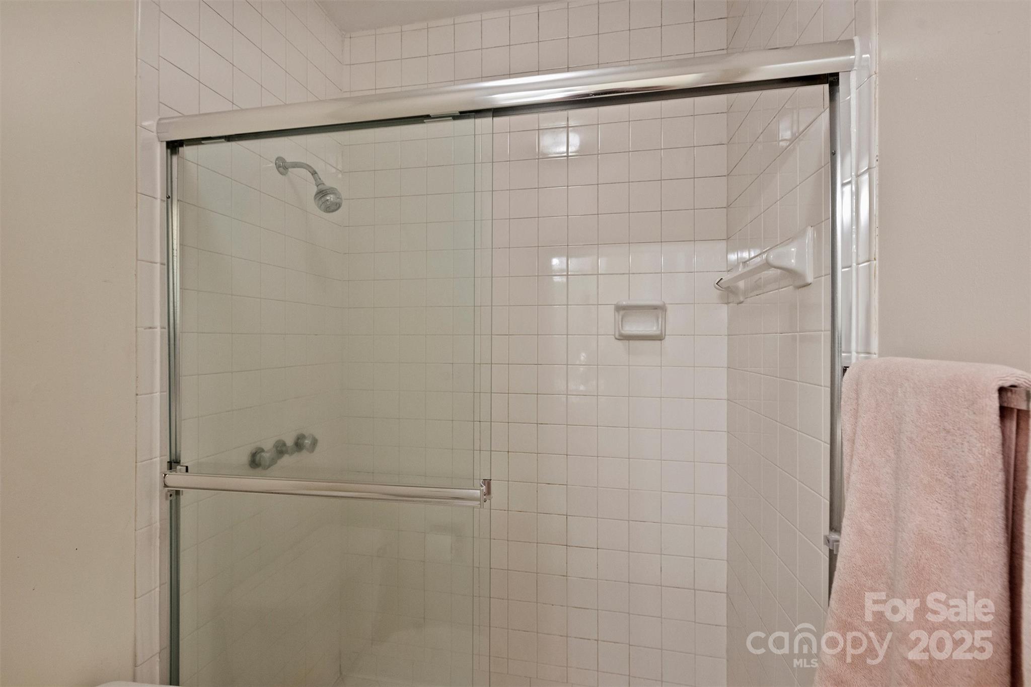 904 Cherokee Road Charlotte, NC 28207 - Photo 25 of 36 a bathroom with a shower