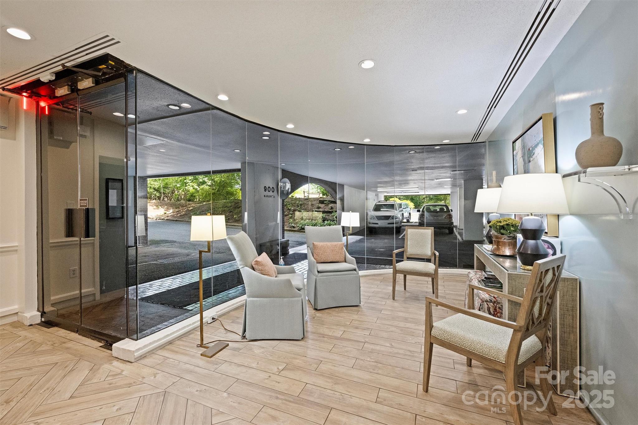 904 Cherokee Road Charlotte, NC 28207 - Photo 31 of 36 a living room with furniture and a flat screen tv