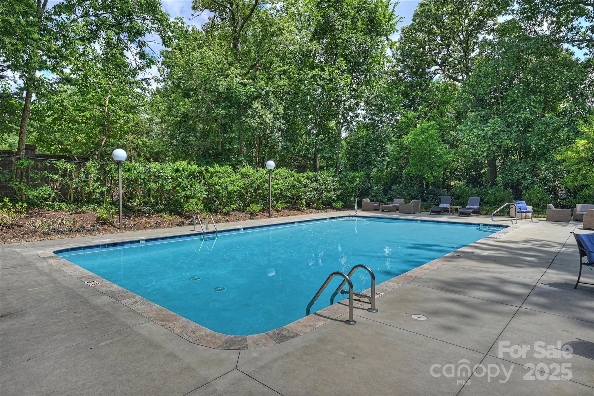 904 Cherokee Road Charlotte, NC 28207 - Photo 33 of 36 a view of a swimming pool with an outdoor space