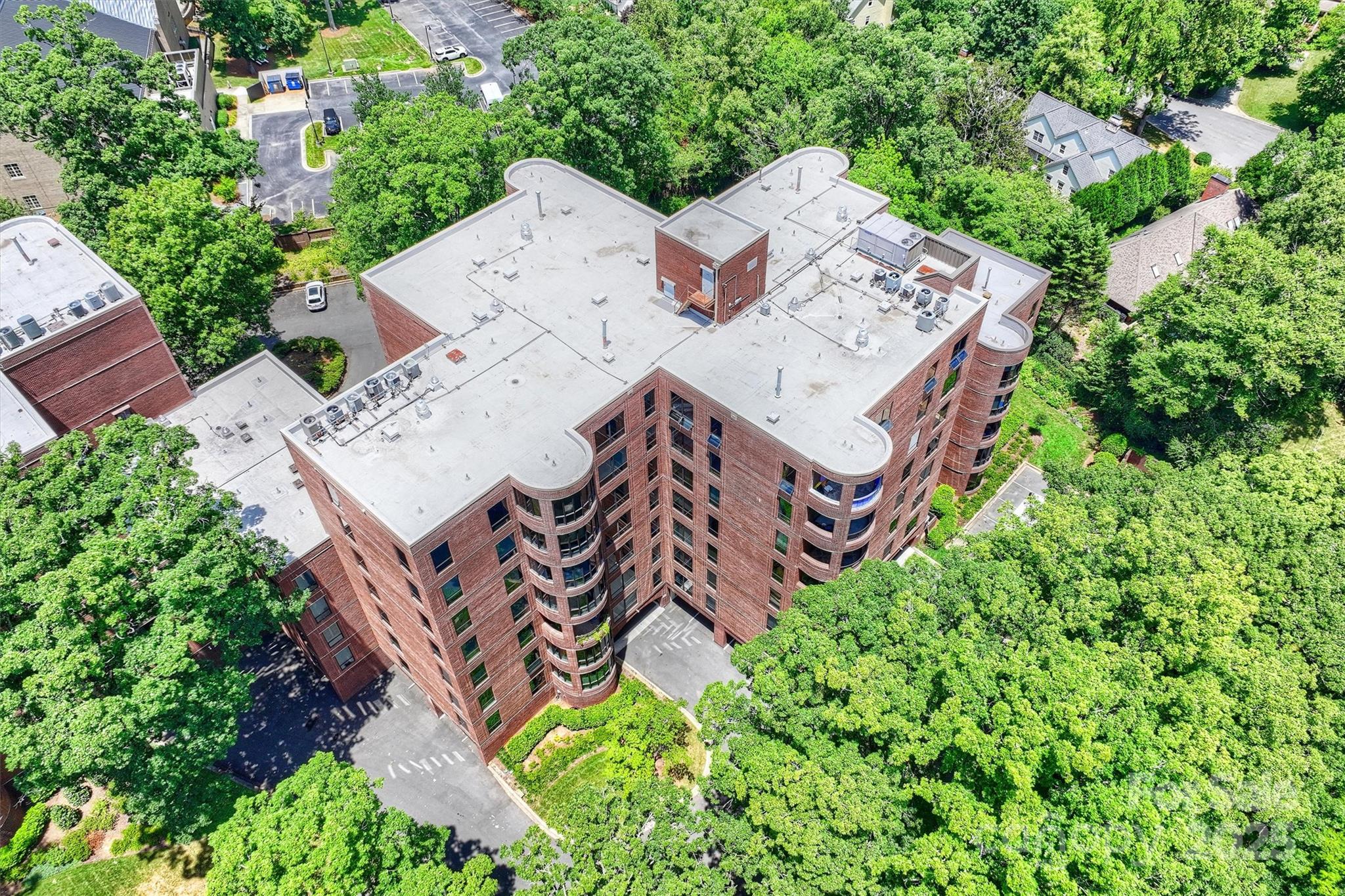 904 Cherokee Road Charlotte, NC 28207 - Photo 35 of 36 an aerial view of a house with garden space and street view