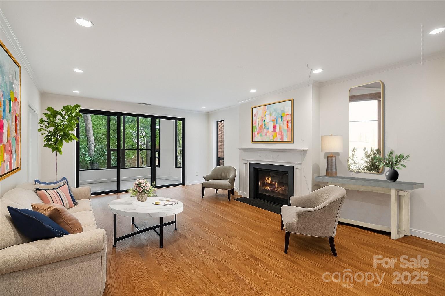 904 Cherokee Road Charlotte, NC 28207 - Photo 5 of 36 a living room with furniture and a fireplace