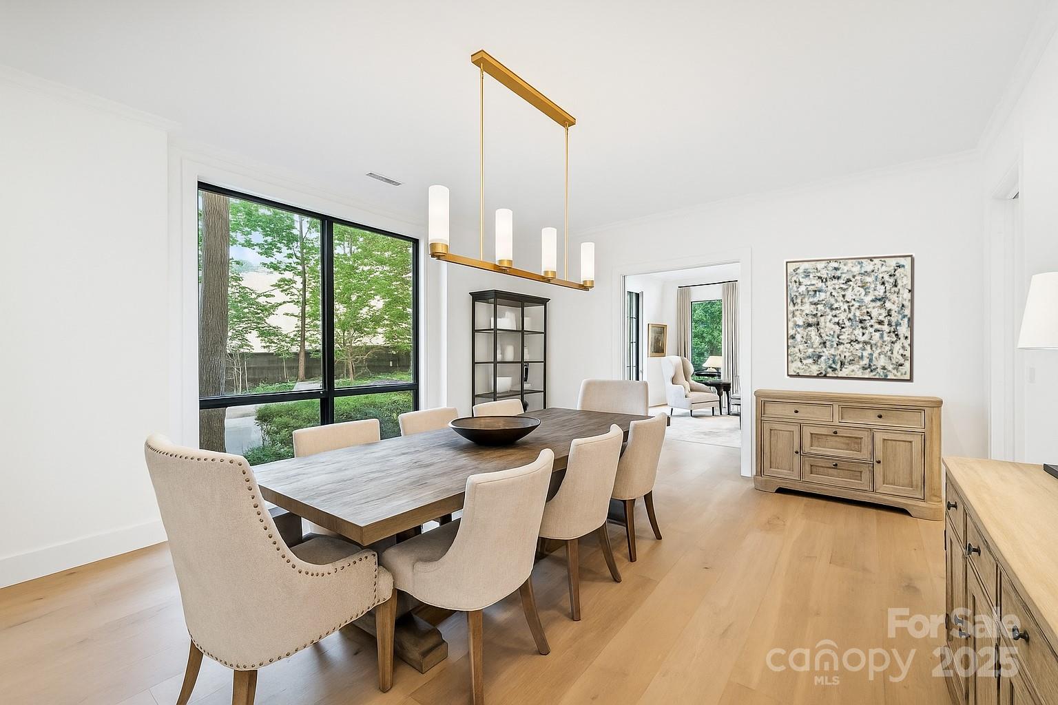 904 Cherokee Road Charlotte, NC 28207 - Photo 7 of 36 a view of a dining room with furniture window and outside view